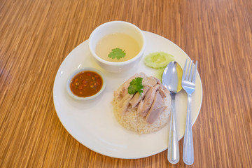 Chicken rice with soup, salad and sauce