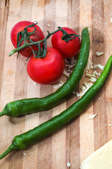 tomato and green pepper on white background