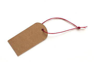 blank black cardboard price tag or label tag with red thread isolated on white background.