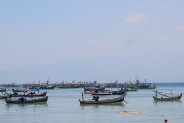 Fototapeta na wymiar FISHING BOATS IN GILI KETAPANG PORT, PROBOLINGGO, EAST JAVA, INDONESIA