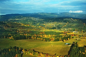 Czech Republic-Autumn view of mountains and village Strazne