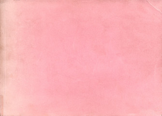 Old pink paper texture. Rough faded surface. Blank retro page. Empty place for text. Perfect for background and vintage style design.