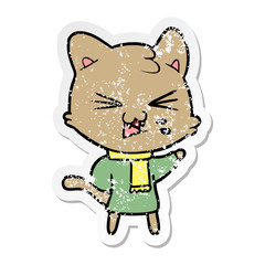 distressed sticker of a cartoon hissing cat