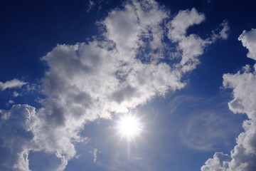 Beautiful cloud view with blue sky and sun light used as a background image.