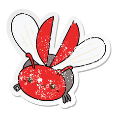 distressed sticker of a quirky hand drawn cartoon flying beetle