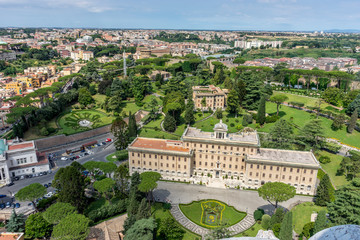 Fototapeta premium Roman Cityscape, Panaroma viewed from the top of Saint Peter's square basilica, Palace of the Governorate of Vatican City State