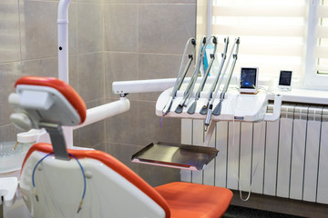 Dentistry tools in a bright lit cabinet