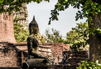 Old Buddha statue Sitting at the old temple in Ayutthaya, Thailand