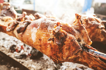 crispy lamb rotating on the spit