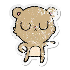distressed sticker of a peaceful cartoon bear