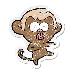 Obraz na płótnie Canvas distressed sticker of a cartoon shocked monkey