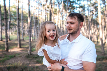 Fototapeta premium Happy father and daughter having fun outdoors.