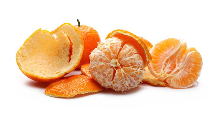 Peeled clementine, orange mandarin slices isolated on white background