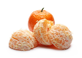Peeled clementine, orange mandarin slices isolated on white background