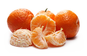 Peeled clementine, orange mandarin slices isolated on white background