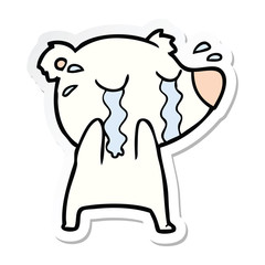 sticker of a cartoon crying polar bear