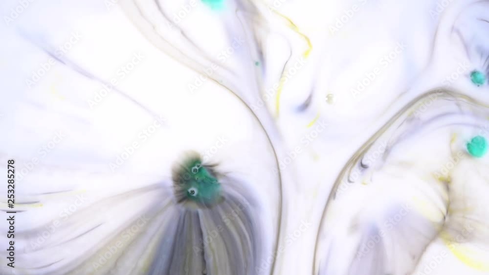 Aufkleber colorful background of ink reaction to soap drops. colored inks react to a drop of liquid soap in mi