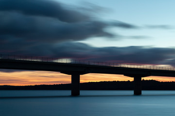 Nice sunset after a viaduct crossing over a lake