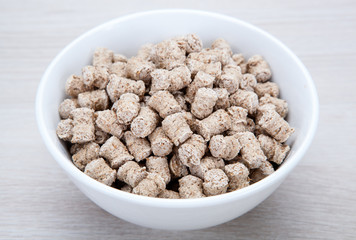 bread bran dish on a gray table close up