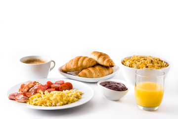 Breakfast with scrambled eggs, bacon, tomatoes,coffee,orange juice ,croissant and corn flakes isolated on white background. Copyspace