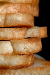 White toasted bread in a pile closeup. Shallow depth of field