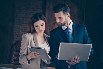 Close up photo attentive she her business lady he him his guy best boss seo employer banker manager coacher look watch check materials planning future actions office wearing formal wear suit