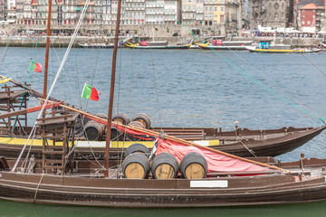 Fototapeta na wymiar Rabelo, traditional boat with wine barrels in Porto