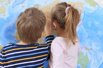 Boy and girl is playing in travelers