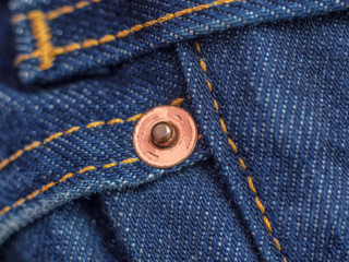 Denim with metal button