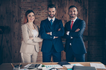 Portrait of three stylish trendy beautiful handsome cheerful representative business sharks folded...