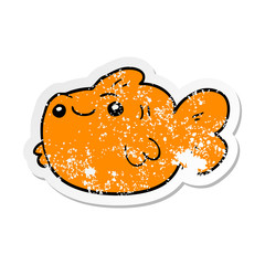 distressed sticker of a cartoon fish