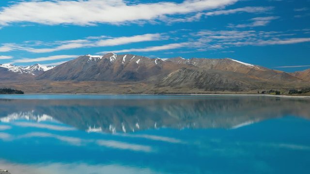 Lake Tekapo with reflection of sky and mountains, New Zealand