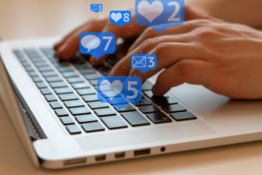 Man is using laptop with black keys, Social media and social networking. Marketing concept