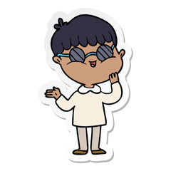 sticker of a cartoon boy wearing spectacles
