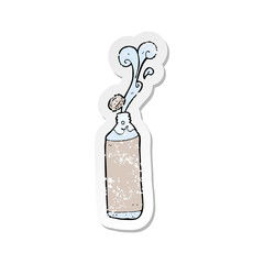 retro distressed sticker of a cartoon juice bottle