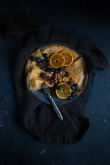 Pancakes with blueberry and orange