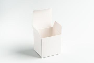 white square cardboard box on a white background, moke up