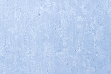 Fototapeta na wymiar Frosty patterns on a frozen ice box in the early morning