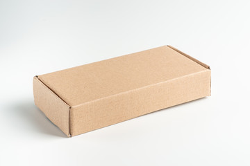 Kraft cardboard box on a white background, moke up