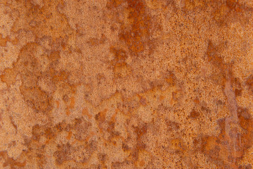 Old Distressed Brown Terracotta Copper Rusty Stone Background with Rough Texture Multicolored Inclusions. Stained Gradient Coarse Grainy Surface