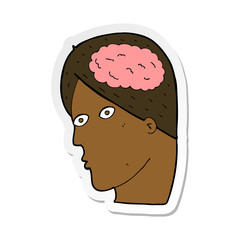 sticker of a cartoon head with brain symbol