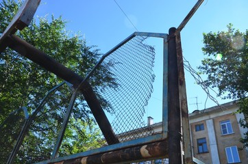 Fototapeta premium Playgrounds for children in the city of Korkino in the southern Urals. Province, poverty, desolation…