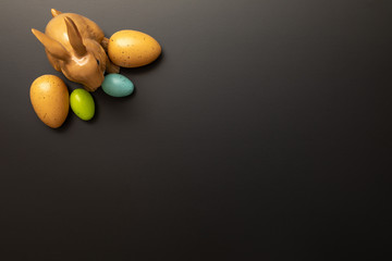 a happy easter decoration with a bunny and some eggs