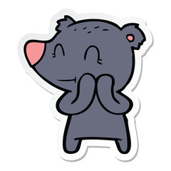 sticker of a smiling bear cartoon