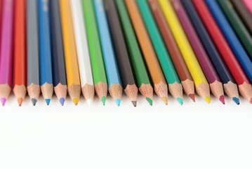 Colour pencils isolated on white background close up 