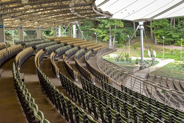Rows of wooden empty seats
