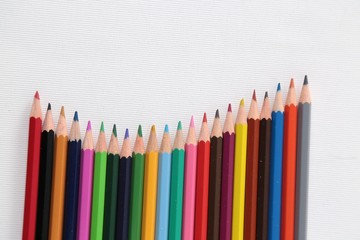 Colour pencils isolated on white background close up 