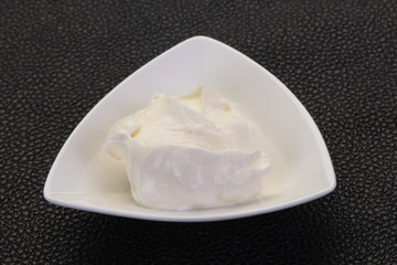 Sour cream in the bowl