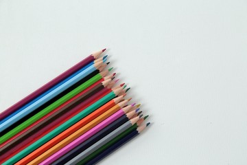 Colour pencils isolated on white background close up 