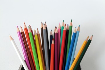 Colour pencils isolated on white background close up 